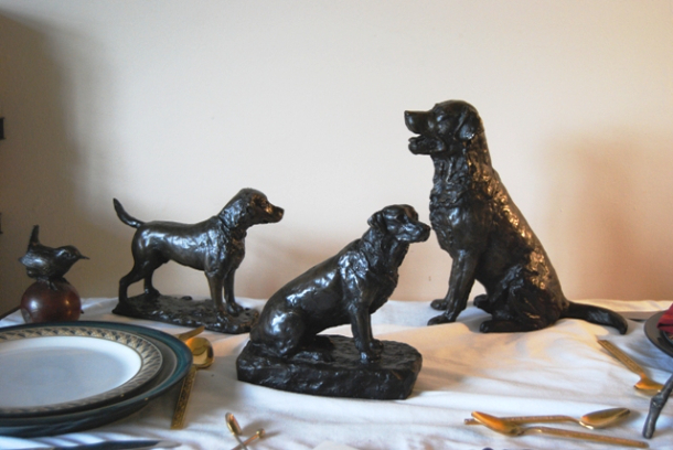 Labradors in Bronze by JOEL on the table